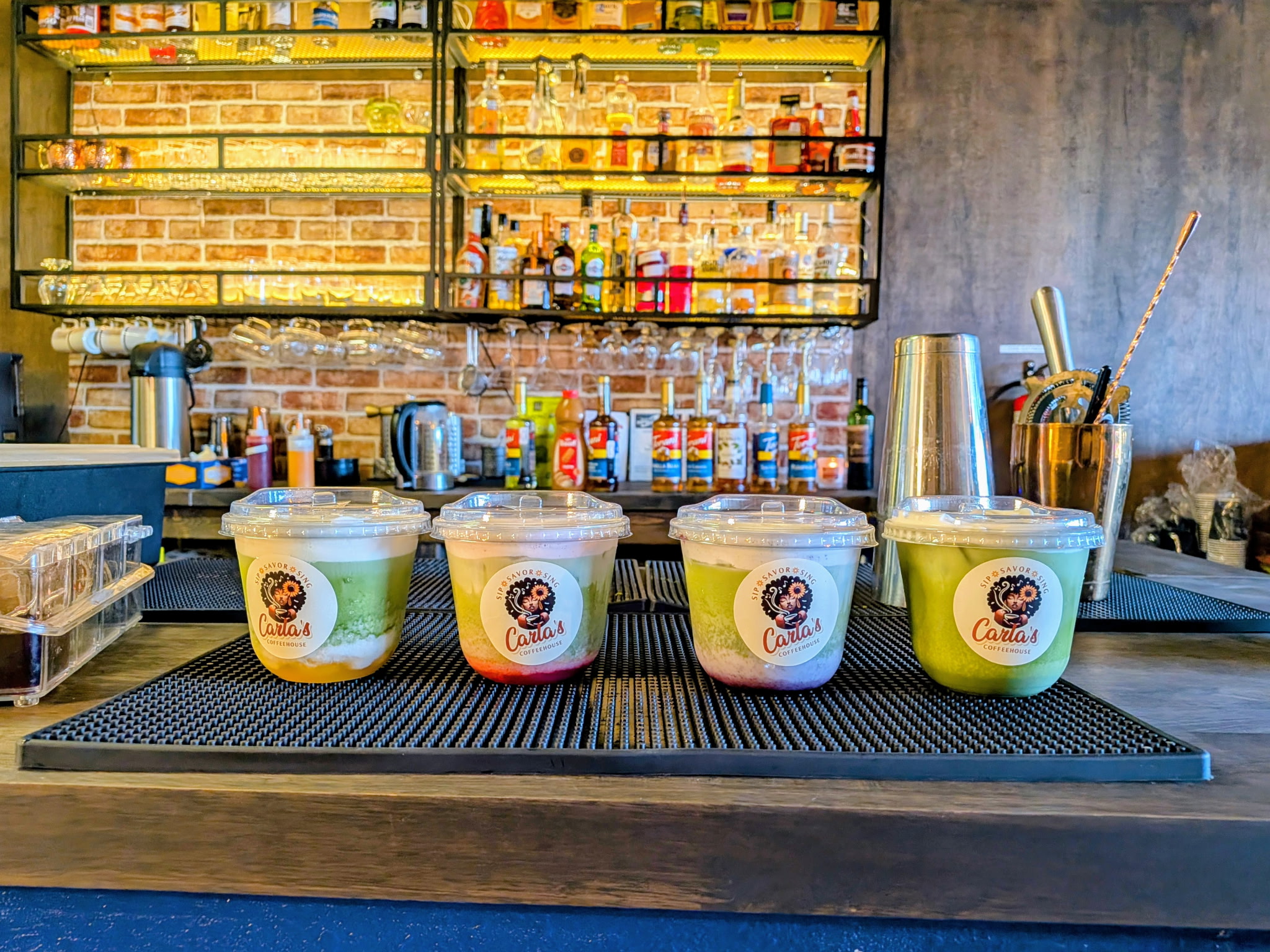 Carla's Coffeehouse matcha drinks on the bar